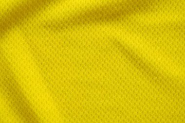 Sarı renkli futbol forması kumaş kumaş kumaş spor giysisi arka plan, yakın çekim