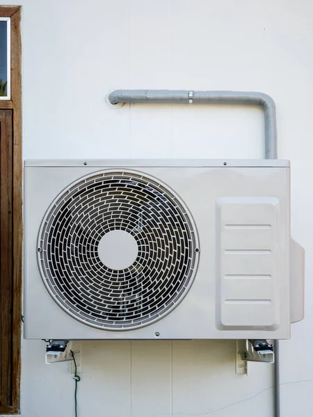 outdoor air conditioning unit on the wall