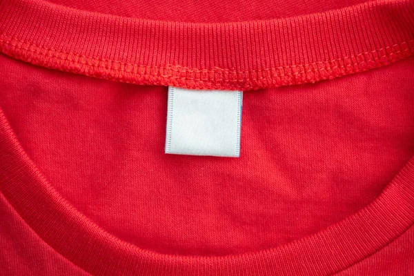 Etiqueta Etiqueta Roupa Branca Branco Novo Fundo Textura Tecido Camisa — Fotografia de Stock