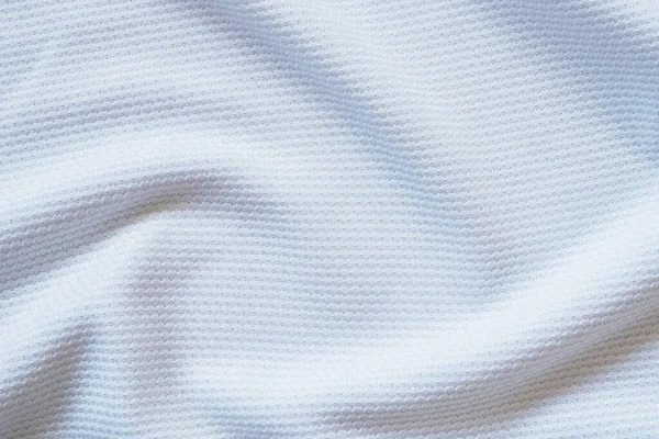 Beyaz futbol forması kumaş kumaş dokuma spor giysisi arka plan, yakın çekim