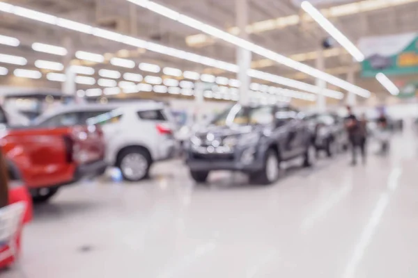 blur row of new car at car showroom dealership abstract defocused background