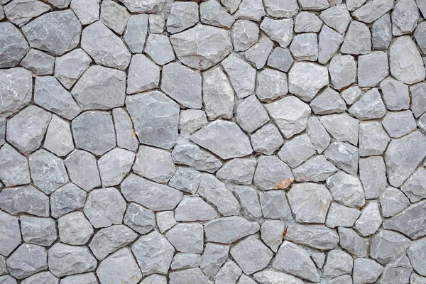 灰色の石壁のテクスチャパターンの背景 — ストック写真