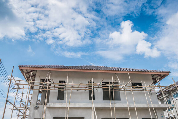 construction residential new house in progress at building site