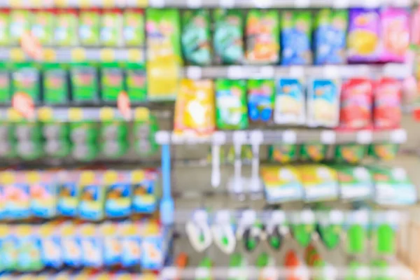 Abstract blur supermarket discount store cleaning tool product shelves interior defocused background