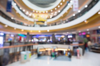 Soyut bulanık, modern alışveriş merkezi içi odaklanmış arka plan