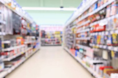 Donanım ve araç arka planına sahip soyut bulanık süpermarket koridoru