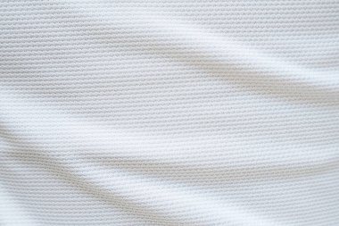 Beyaz futbol forması kumaş kumaş dokuma spor giysisi arka plan, yakın çekim
