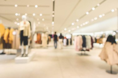 Alışveriş merkezinin arka planının soyut bulanık elbise mağazası görüntüsü