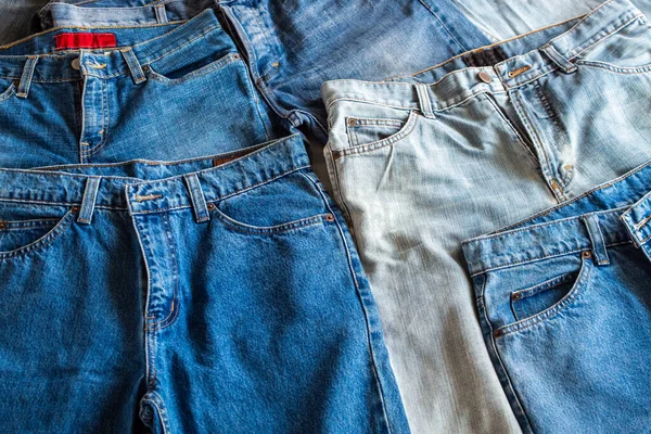Many Denim Blue Jeans Background — Stock Photo, Image