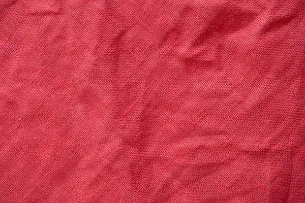 赤リネンシャツ生地の質感の背景 — ストック写真