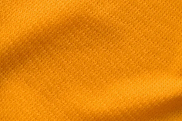 オレンジのスポーツウェアファブリックジャージサッカーシャツテクスチャトップビュー — ストック写真