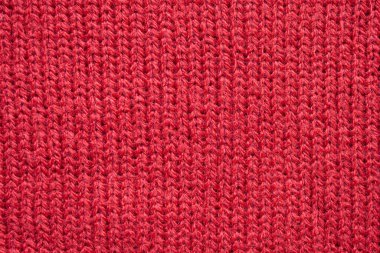 Kırmızı örülmüş yün kumaş dokusu arkaplanı