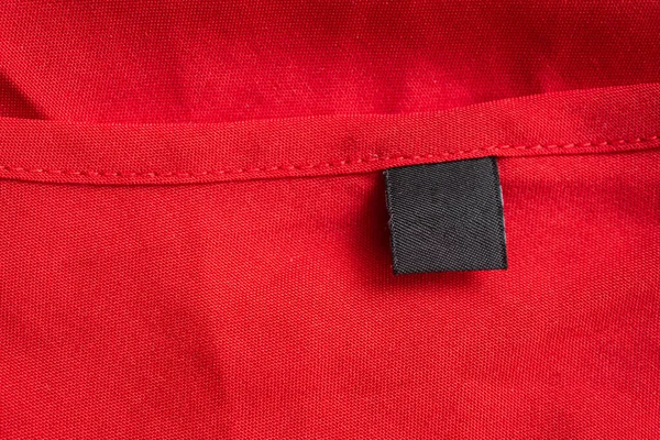 Blank Czarny Pralnia Odzież Etykieta Czerwony Kolor Tkaniny Tekstury — Zdjęcie stockowe