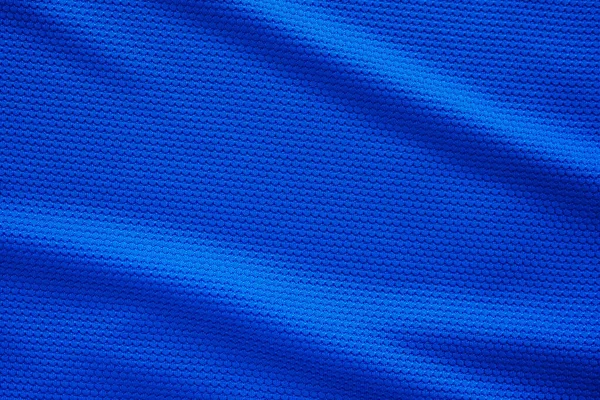 Blue football jersey clothing fabric texture sports wear background, close up top view