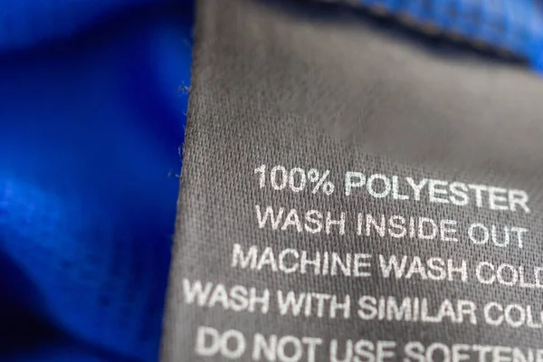 Lavanderia Preta Instruções Lavagem Roupas Etiqueta Camisa Azul Esporte Poliéster — Fotografia de Stock