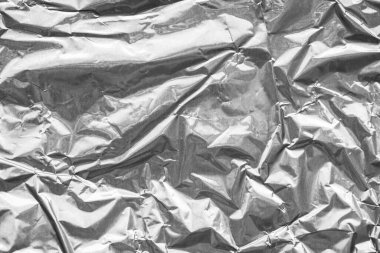 Parlak metal gri folyo buruşuk doku arka planı