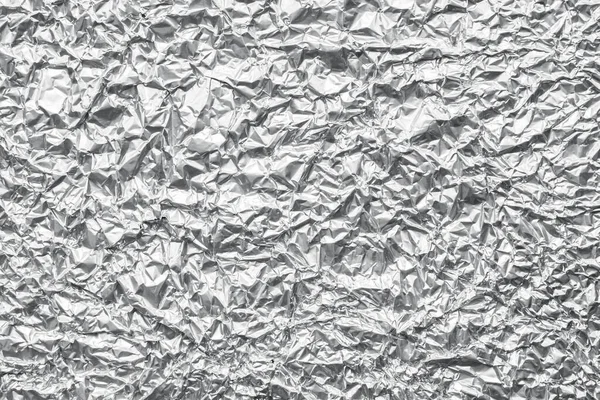 Shiny metal silver gray foil crumpled texture background