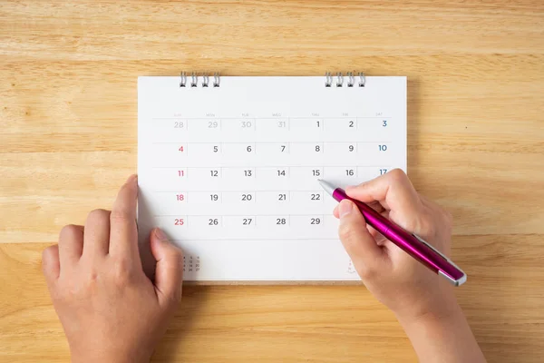 Calendar Page Table Female Hand Holding Pen Top View — Stock Photo, Image