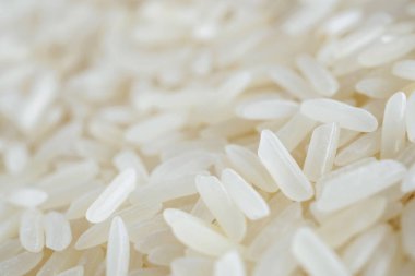 Tayland Jasmine pirinç tanecikleri arka planda.