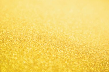 Soyut Altın Işıltılı Noel arkaplanı Bokeh ışığı ile bulanıklaşıyor