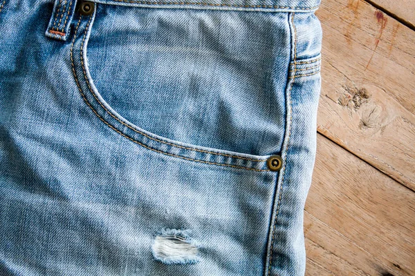 Close Jeans Azul Textura Jeans Azul Chão Madeira — Fotografia de Stock