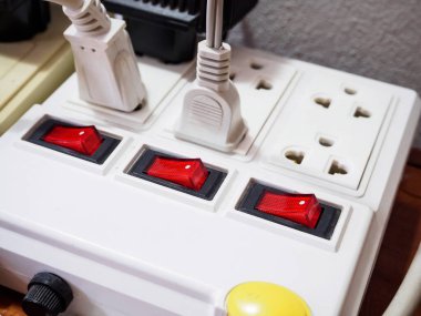Multiple power socket with connected plugs clipart