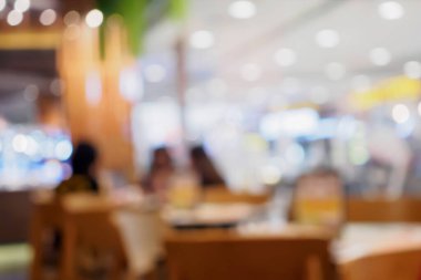 Kafe restoranındaki bulanık müşteriler ya da Bokeh Light 'lı soyut arka plan