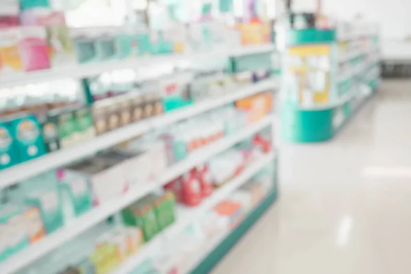 약국에서는 비타민 보충제를 가지고 내부에 상점과 파란색의 건강에 제품을 판매하는 — 스톡 사진