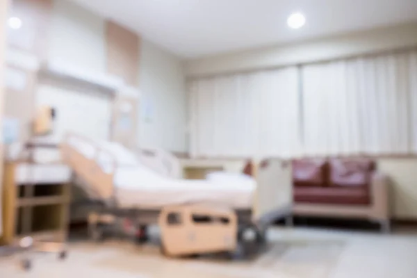 アブストラクトブラー病院の部屋のインテリア背景のための医療ベッド — ストック写真