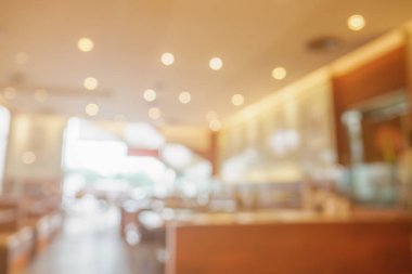 Kafe restoranındaki bulanık müşteriler ya da Bokeh Light 'lı soyut arka plan