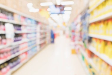 Soyut bulanık süpermarket indirimli mağaza koridoru ve ürün rafları iç odaklanmış arka plan