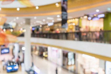 Soyut bulanık, modern alışveriş merkezi içi odaklanmış arka plan