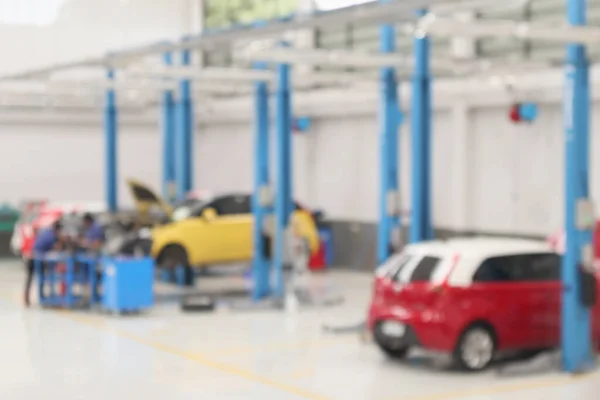 Auto Service Center Mit Auto Der Reparaturstation Bokeh Licht Defokussiert — Stockfoto