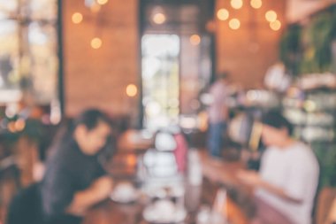 Montaj ürün görüntüleme arka planı için müşteri bulanıklığı olan restoran kafesi ya da kahve dükkânı içi soyut vintage bokeh ışığı