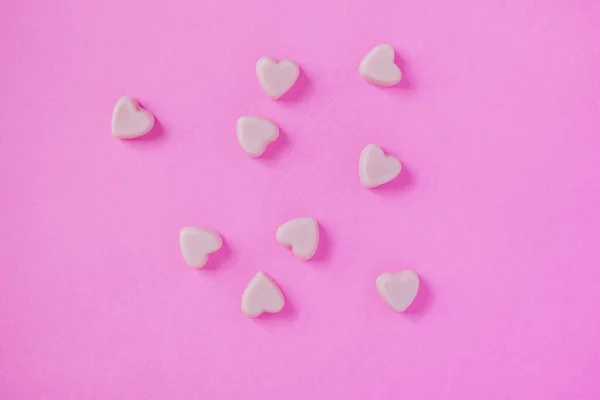 valentine candy hearts shape on pink background