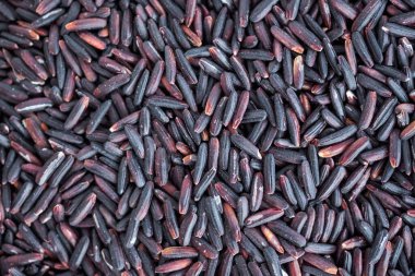 Çiğ organik Tayland riceberry pirinç dokusu arka planı