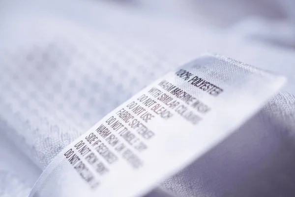 Poliészter Szövet Ruházati Címke Mosási Utasításokkal — Stock Fotó