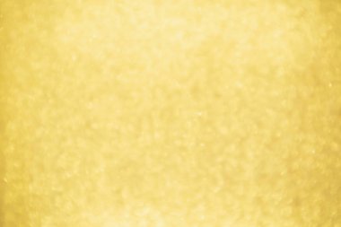 Soyut Altın Işıltılı Noel arkaplanı Bokeh ışığı ile bulanıklaşıyor