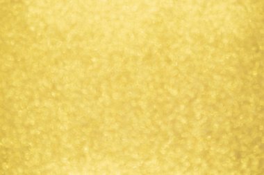 Soyut Altın Işıltılı Noel arkaplanı Bokeh ışığı ile bulanıklaşıyor