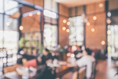 Montaj ürün görüntüleme arka planı için müşteri bulanıklığı olan restoran kafesi ya da kahve dükkânı içi soyut vintage bokeh ışığı