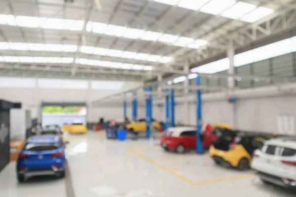 Bil Servicecenter Med Auto Reparation Station Bokeh Ljus Defocused Suddig — Stockfoto