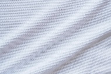 Beyaz futbol forması kumaş kumaş dokuma spor giysisi arka plan, yakın çekim