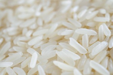 Tayland Jasmine pirinç tanecikleri arka planda.