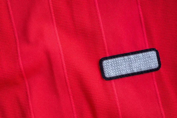 Tag Label Pakaian Kosong Pada Warna Merah Poliester Olahraga Jersey — Stok Foto