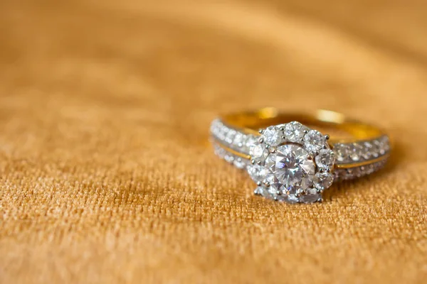 Jewelry Diamond Ring Golden Fabric Background Close Stock Photo