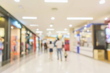 Soyut bulanık, modern alışveriş merkezi içi odaklanmış arka plan