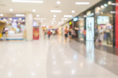 Soyut bulanık, modern alışveriş merkezi içi odaklanmış arka plan