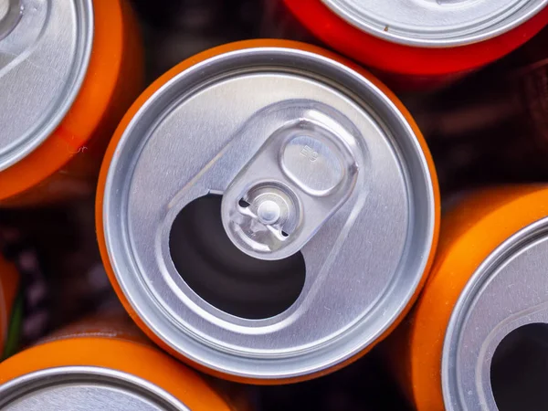 Empty aluminium drink cans recycling background concept, top view closeup