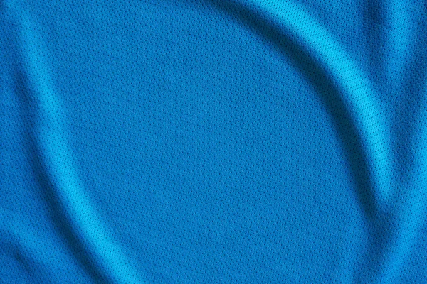ブルーファブリックスポーツウェアエアメッシュテクスチャの背景を持つサッカージャージ — ストック写真