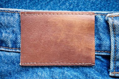 Mavi kot pantolon deri etiket dokusu arka planı